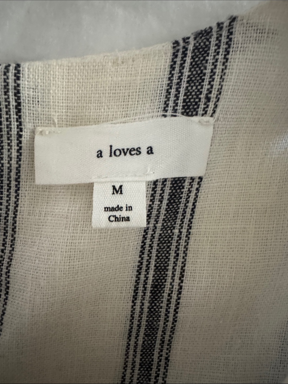 A line cream and black Linen striped dress
